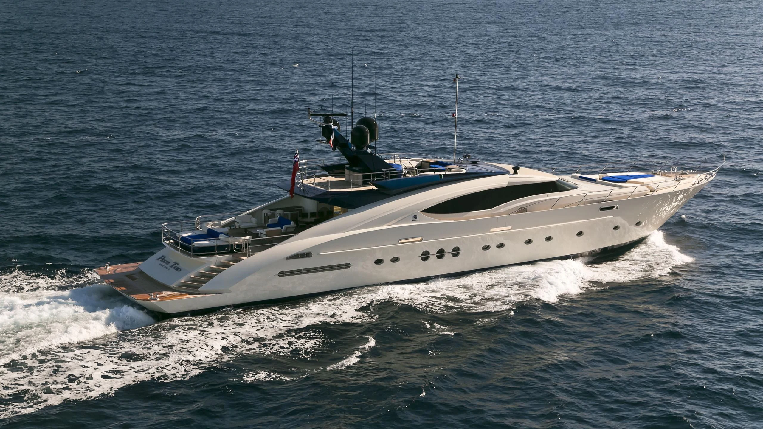 a white boat on the water aboard AK ROYALTY Yacht for Sale