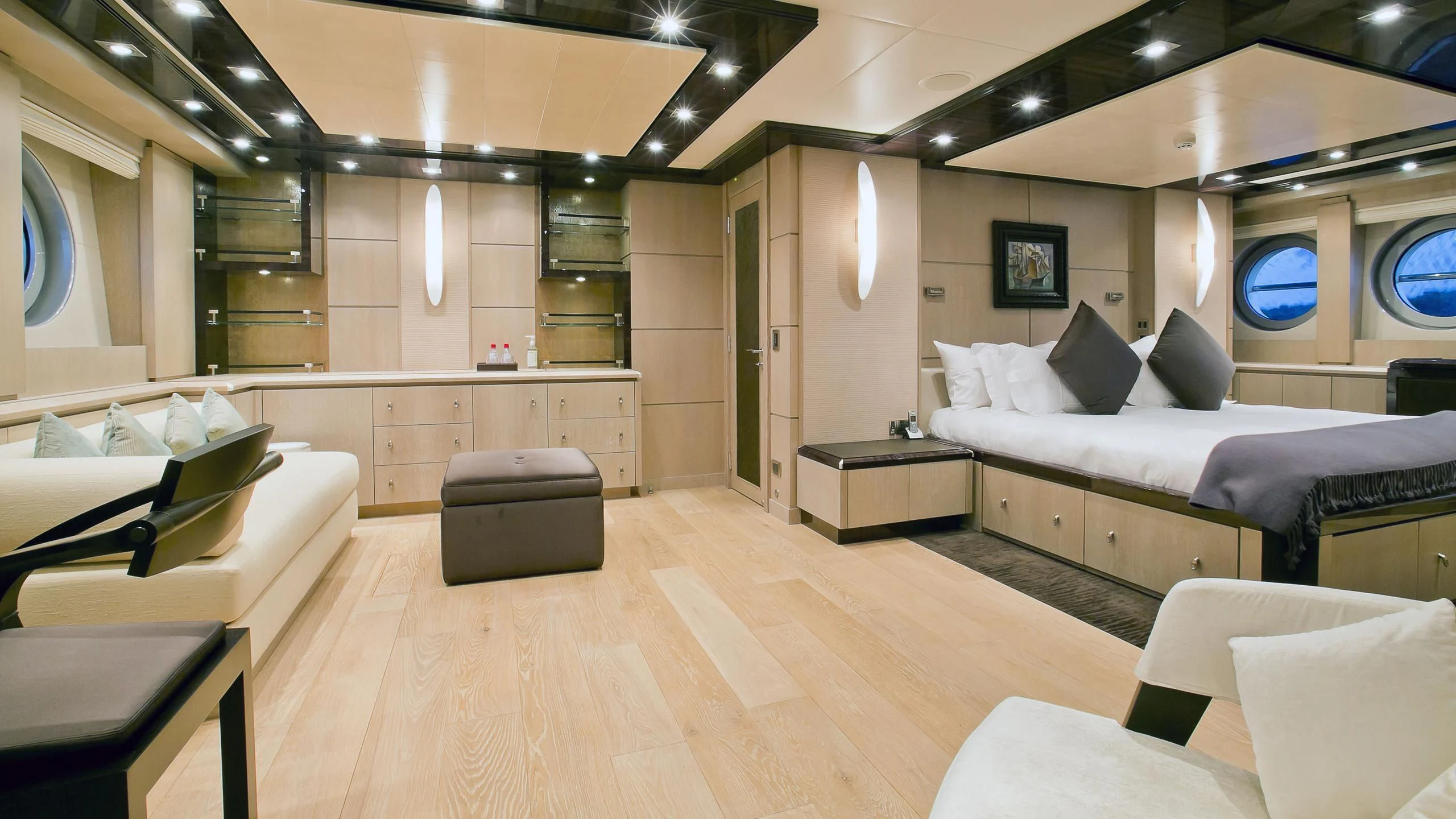 a room with a bed and a couch aboard AK ROYALTY Yacht for Sale