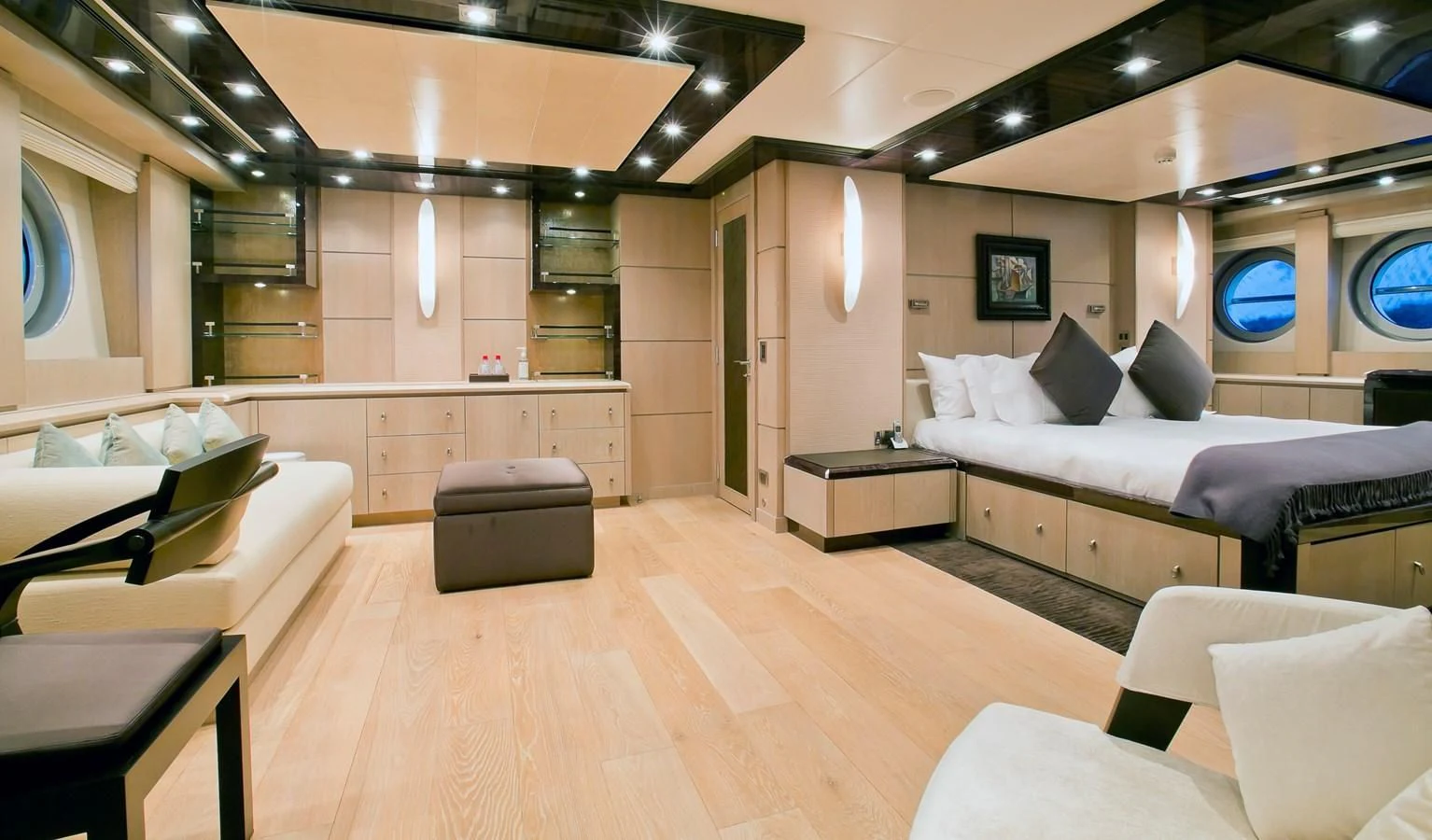a room with a bed and a couch aboard AK ROYALTY Yacht for Sale