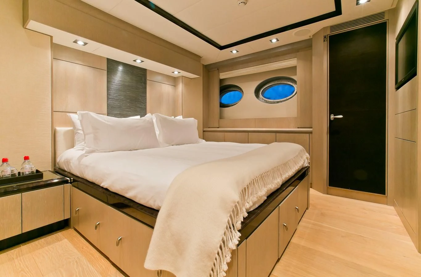 a bed in a room aboard AK ROYALTY Yacht for Sale