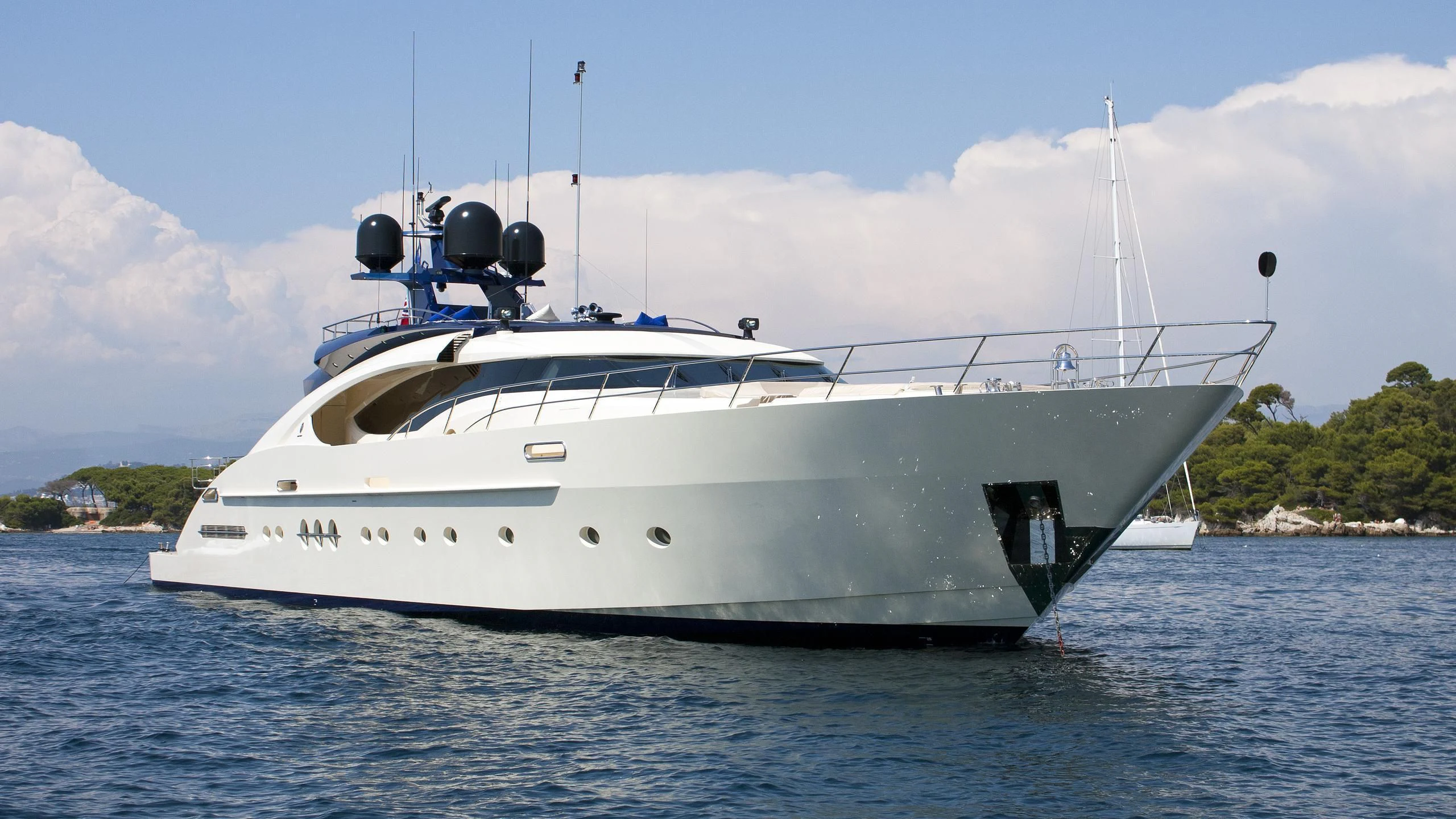 a white yacht on the water aboard AK ROYALTY Yacht for Sale