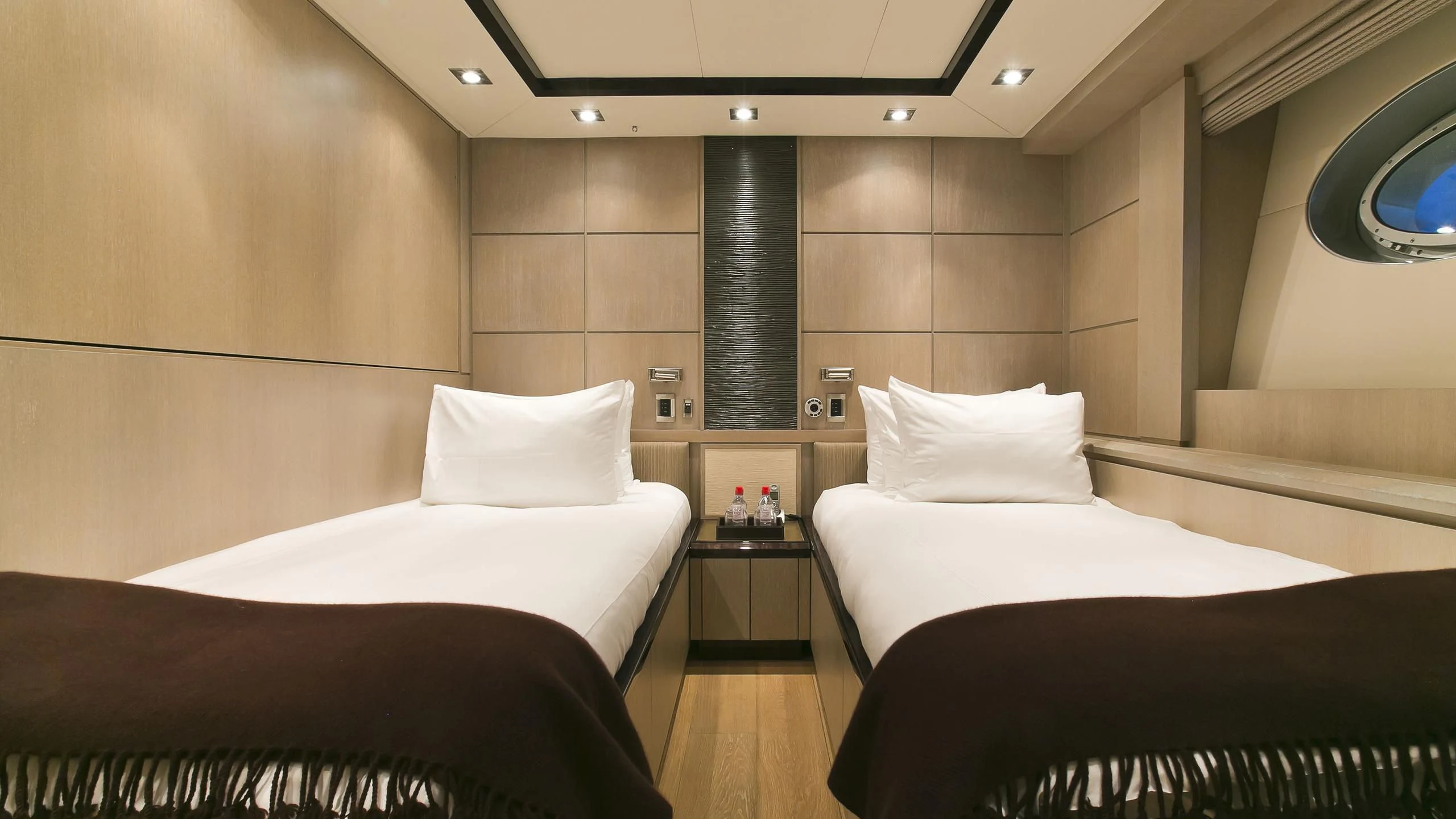 a room with two beds aboard AK ROYALTY Yacht for Sale