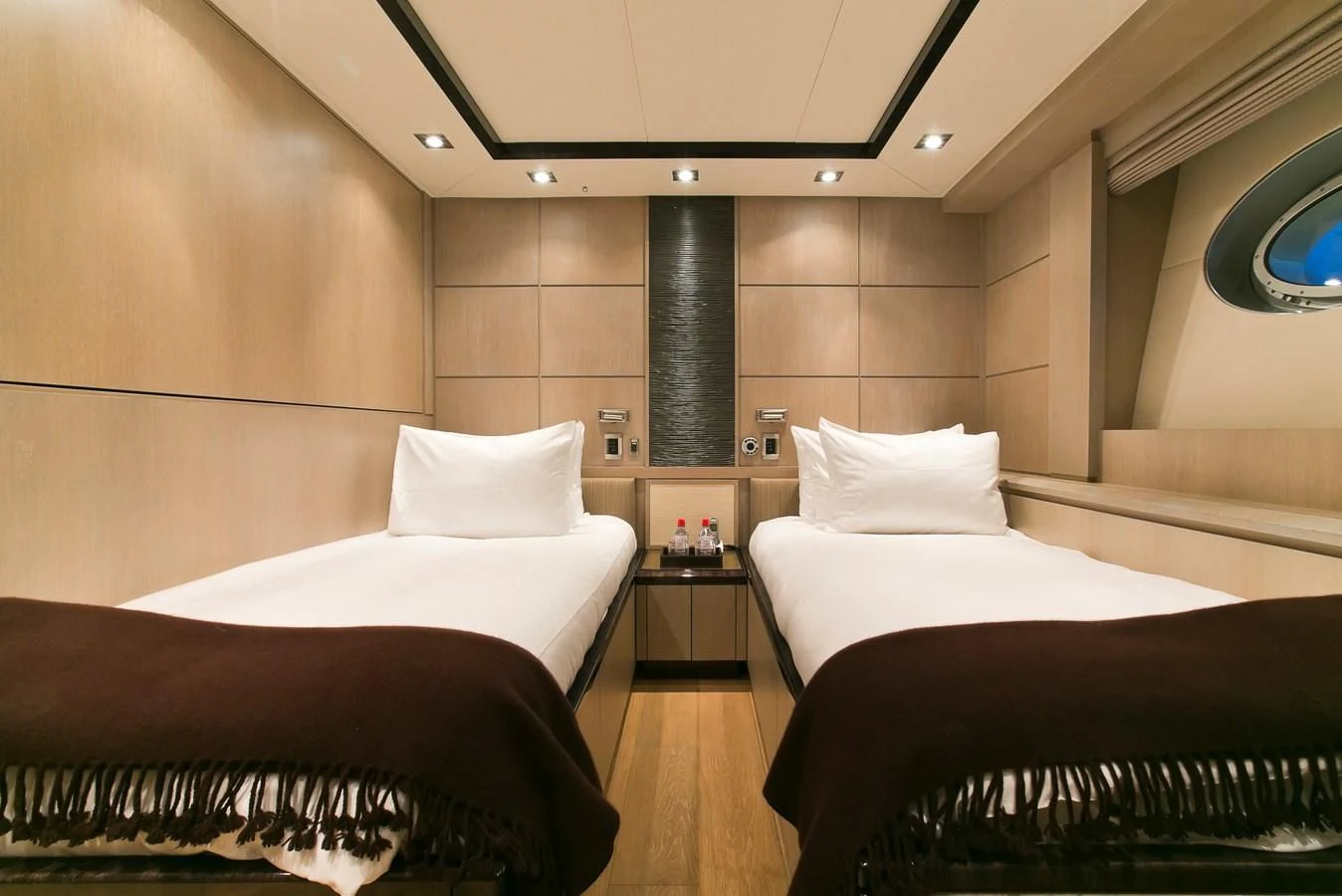 a room with two beds aboard AK ROYALTY Yacht for Sale