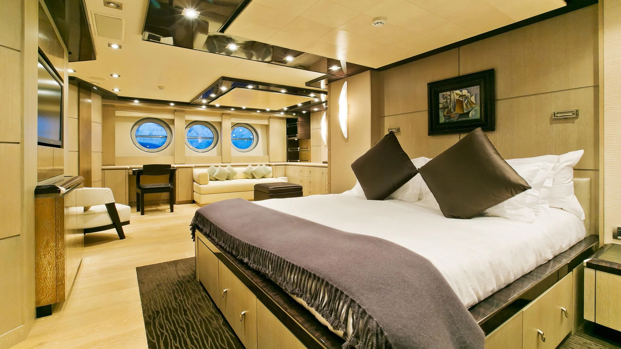 a large bed in a room aboard AK ROYALTY Yacht for Sale