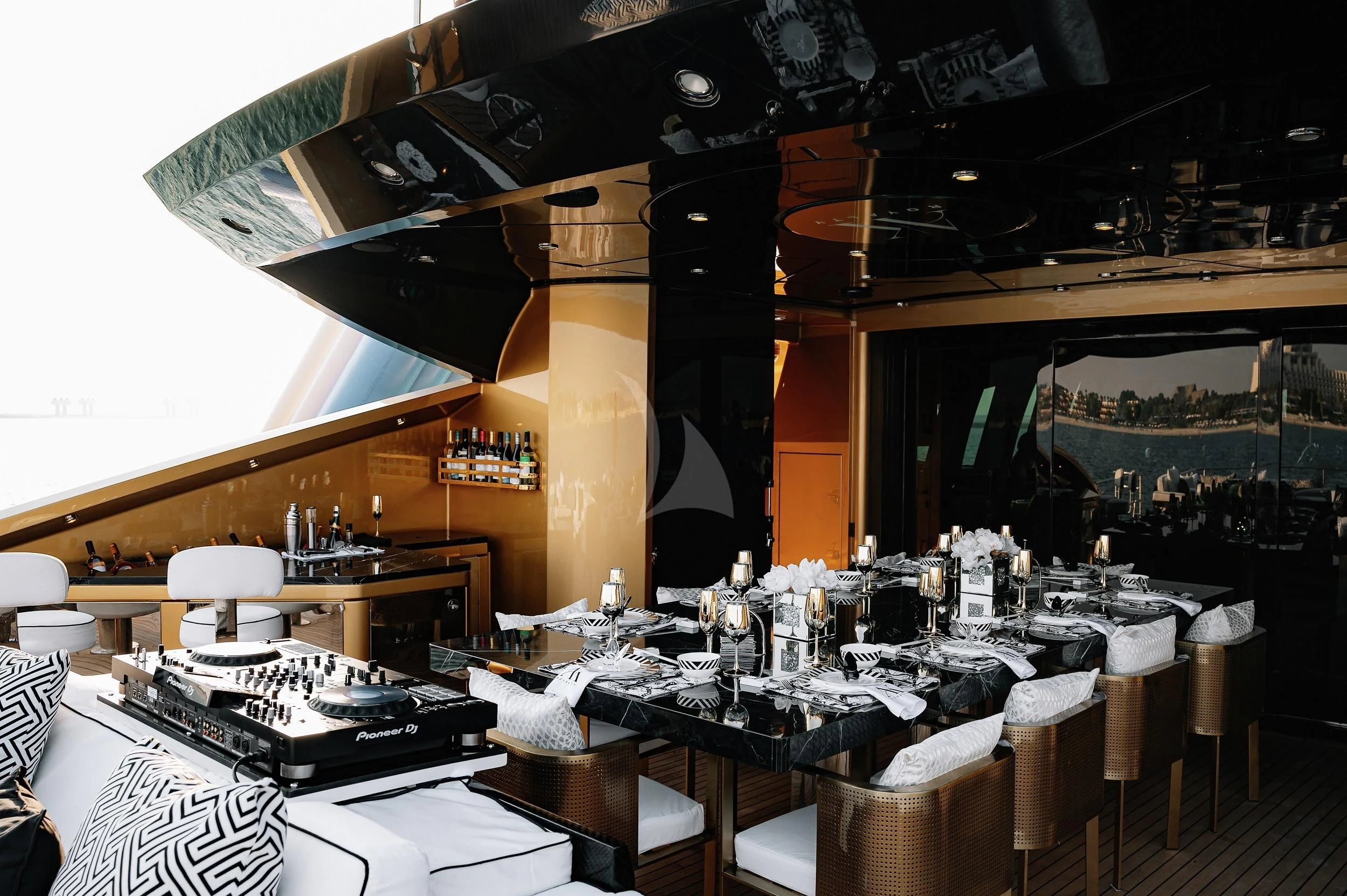 a room with tables and chairs aboard AK ROYALTY Yacht for Sale