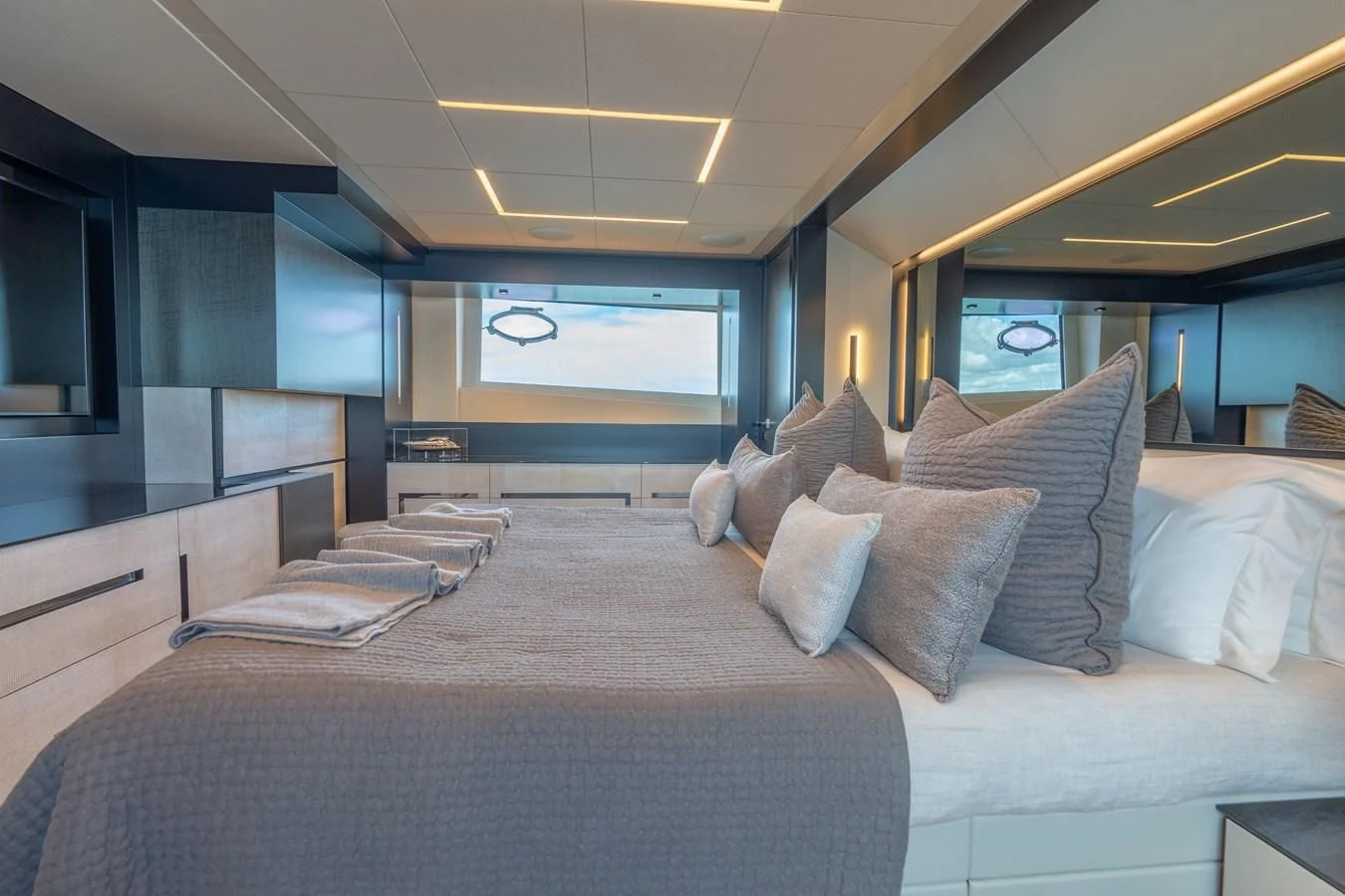 a large bed in a room aboard VINTAGE Yacht for Sale