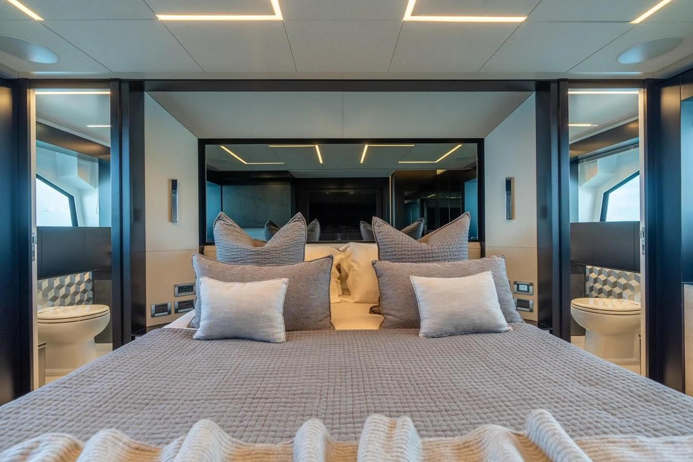 a bed with pillows aboard VINTAGE Yacht for Sale