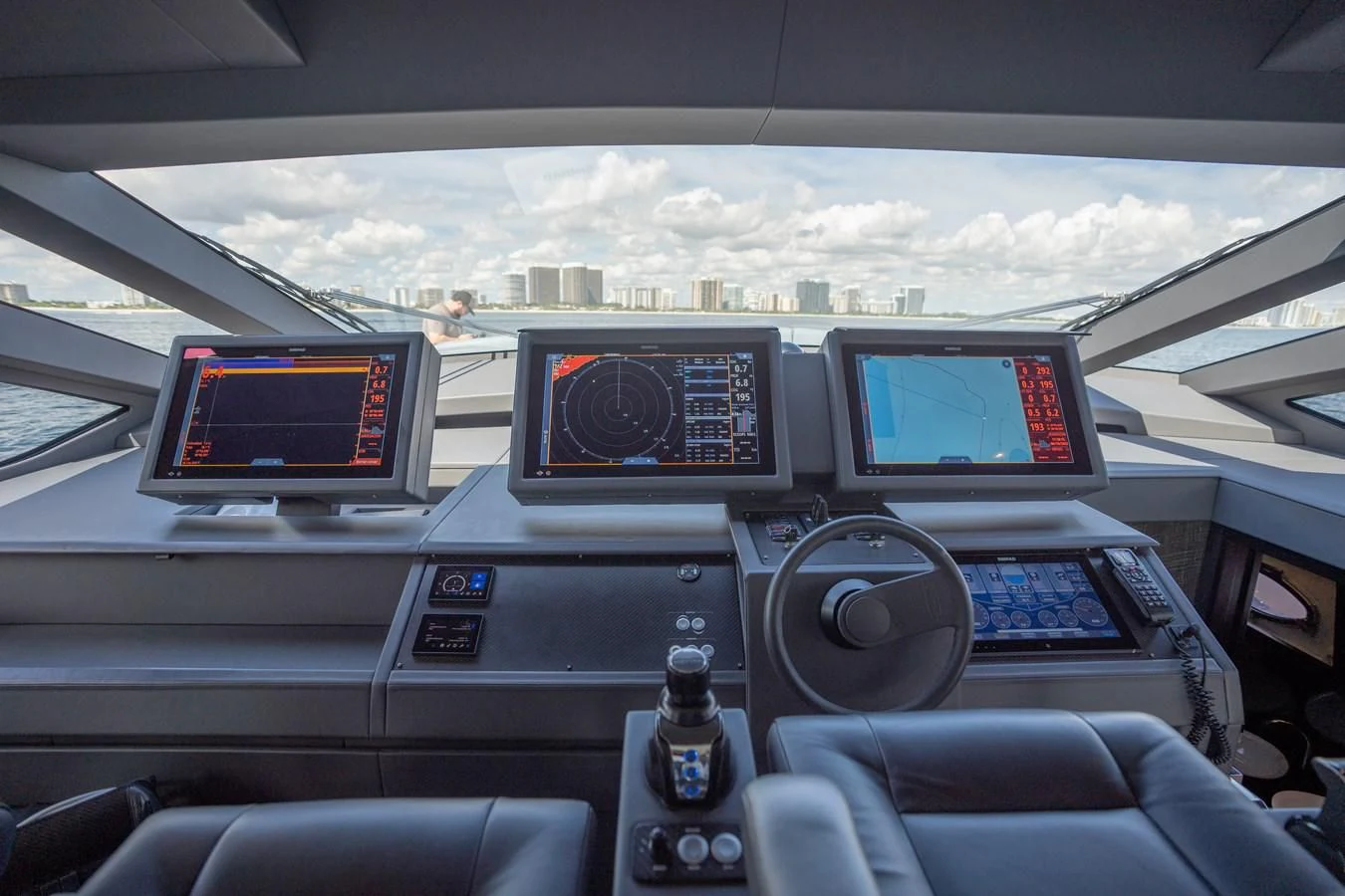 a car with multiple screens aboard VINTAGE Yacht for Sale