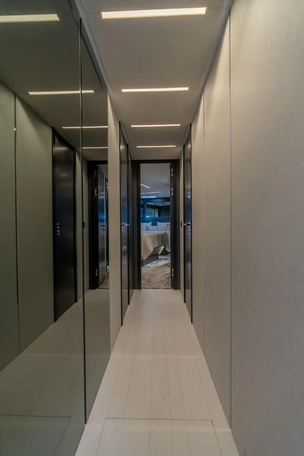 a hallway with doors aboard VINTAGE Yacht for Sale