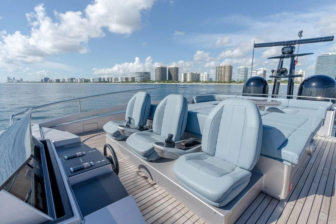 a deck with a view of a city and water aboard VINTAGE Yacht for Sale