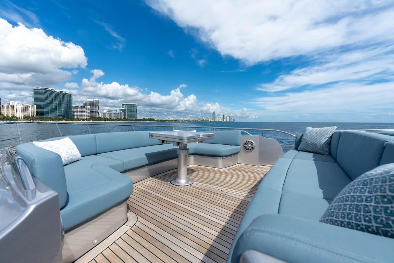 a deck with a view of a city and a large body of water aboard VINTAGE Yacht for Sale