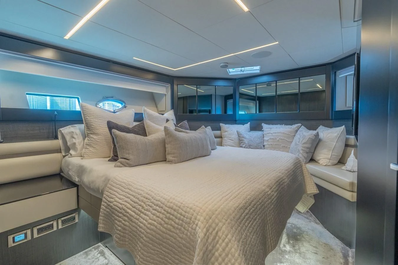 a room with a bed and a couch aboard VINTAGE Yacht for Sale