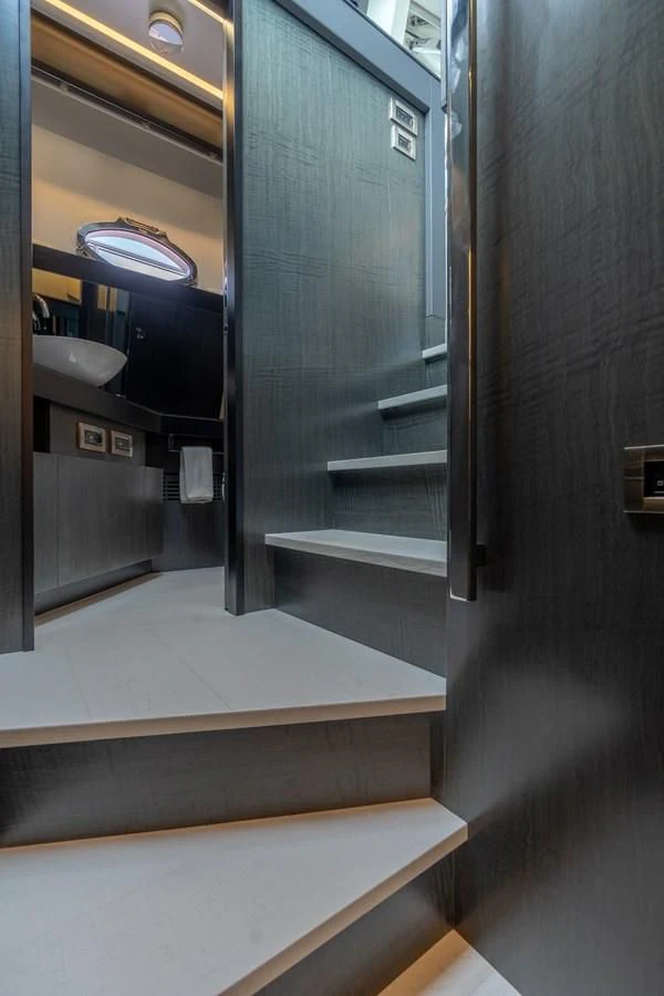 a metal door with a light on it aboard VINTAGE Yacht for Sale