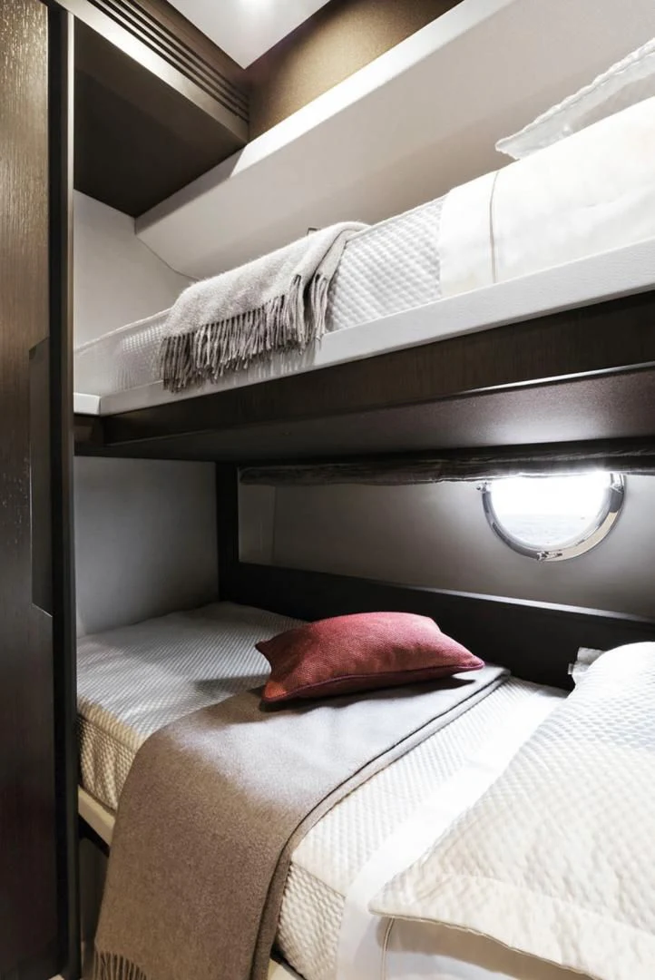 a couple of beds in a room aboard CERULEAN Yacht for Sale