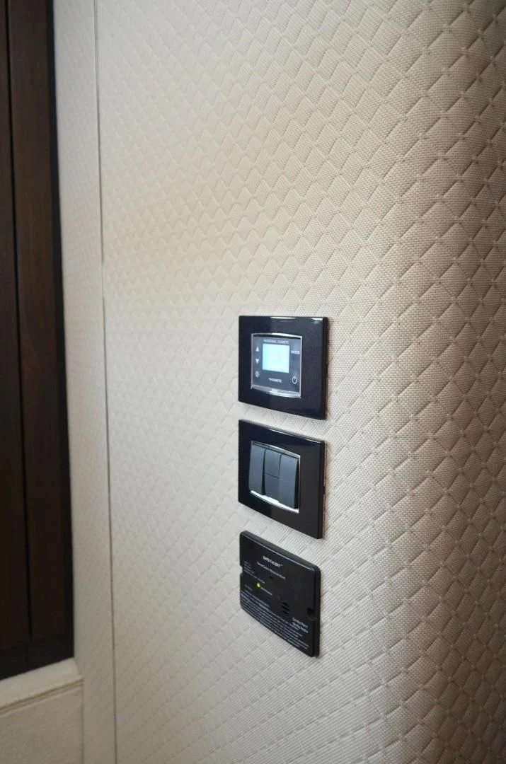 a couple of electronic devices on a white surface aboard CERULEAN Yacht for Sale