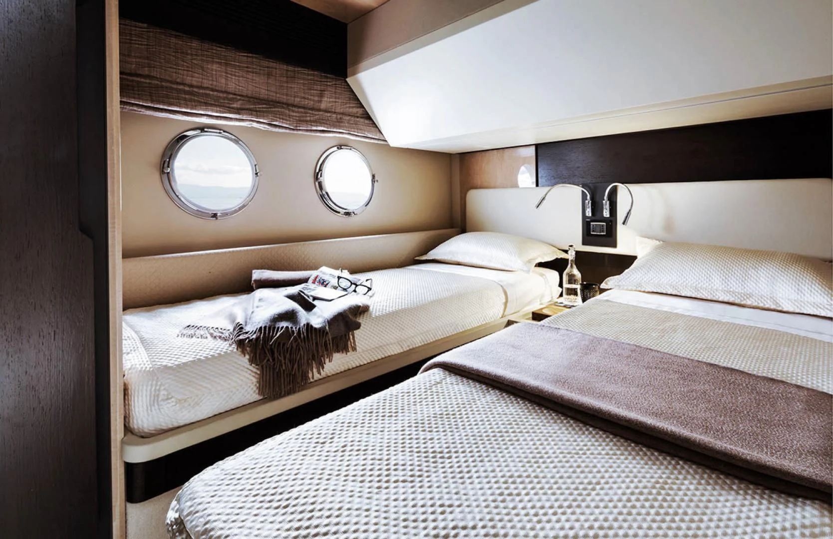 a room with three beds aboard CERULEAN Yacht for Sale