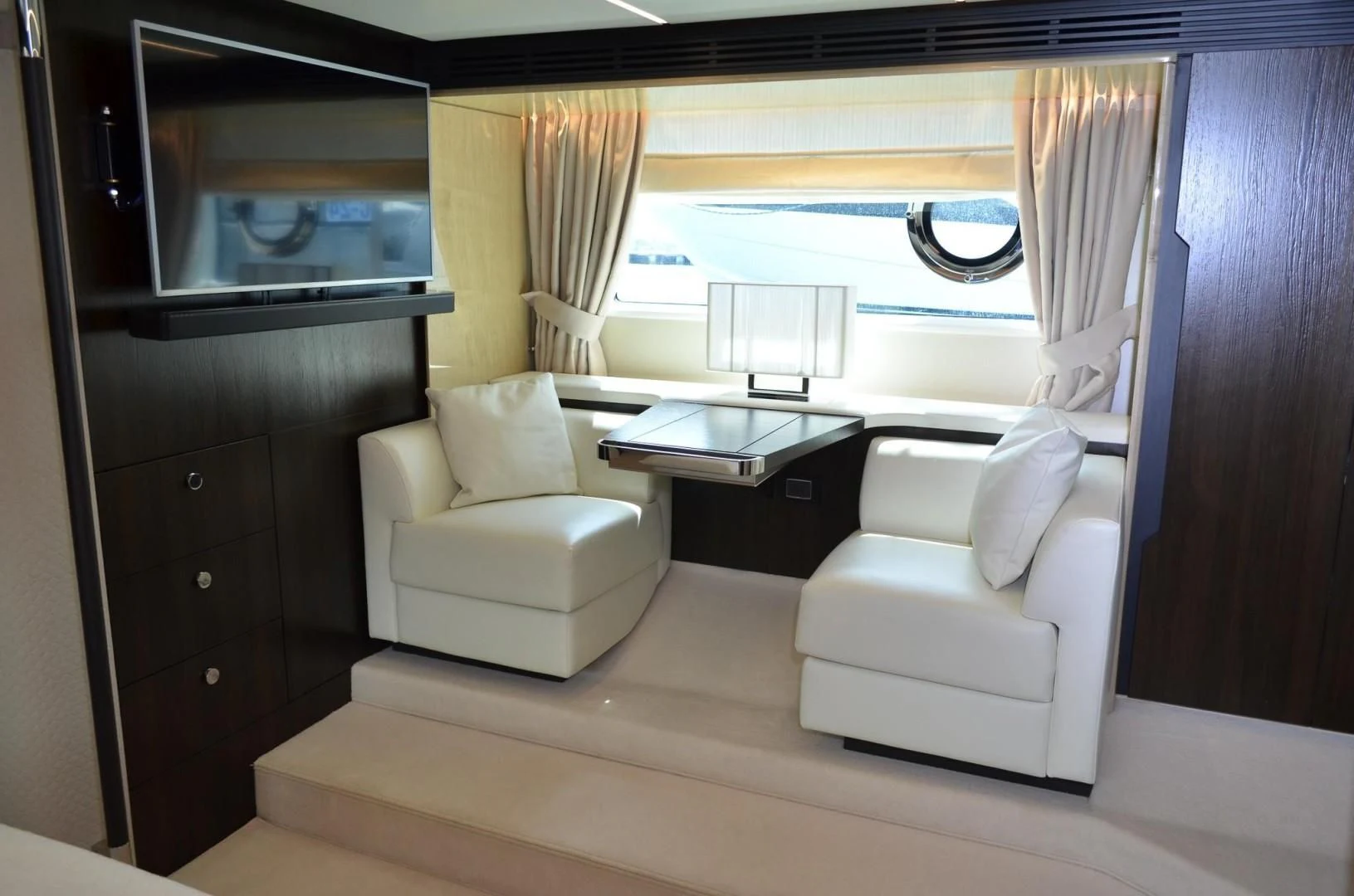 a room with a table and chairs aboard CERULEAN Yacht for Sale
