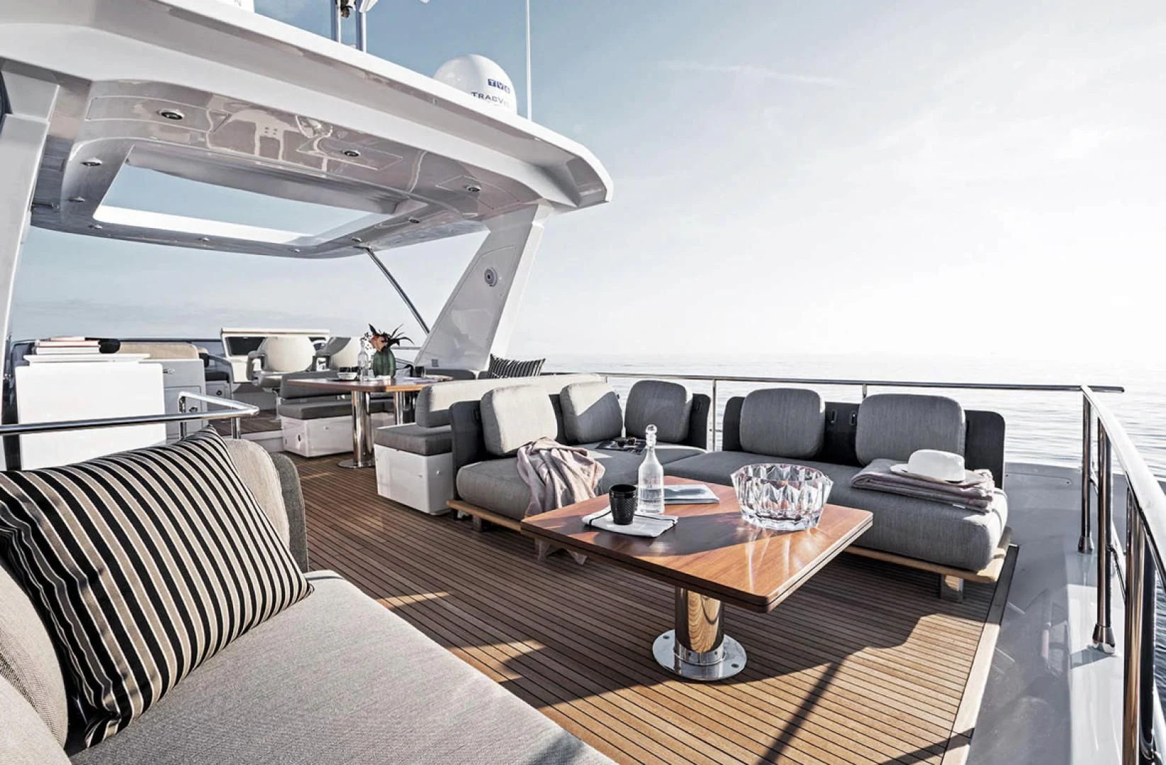 a living room with a couch and a coffee table aboard CERULEAN Yacht for Sale