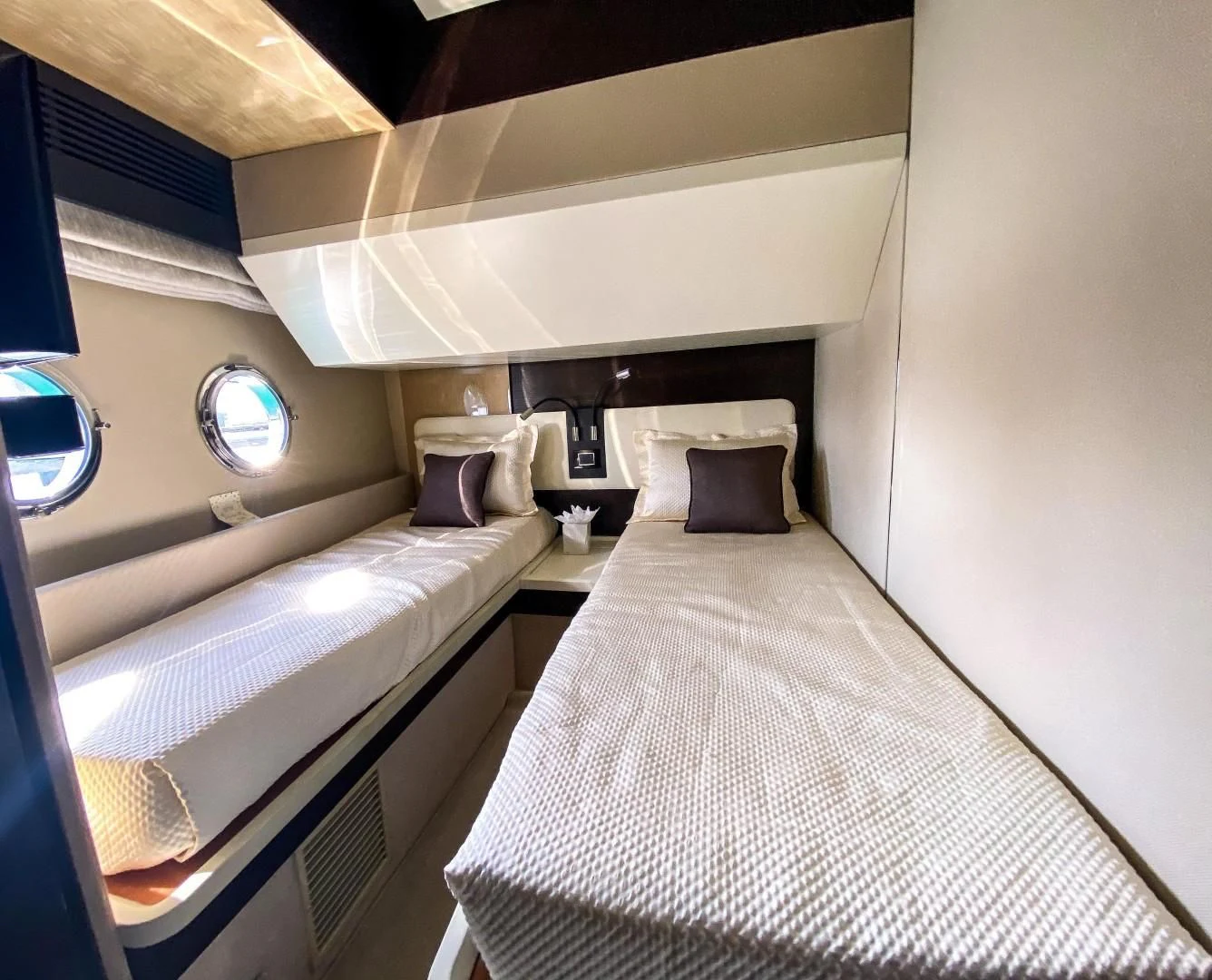 a room with two beds aboard CERULEAN Yacht for Sale