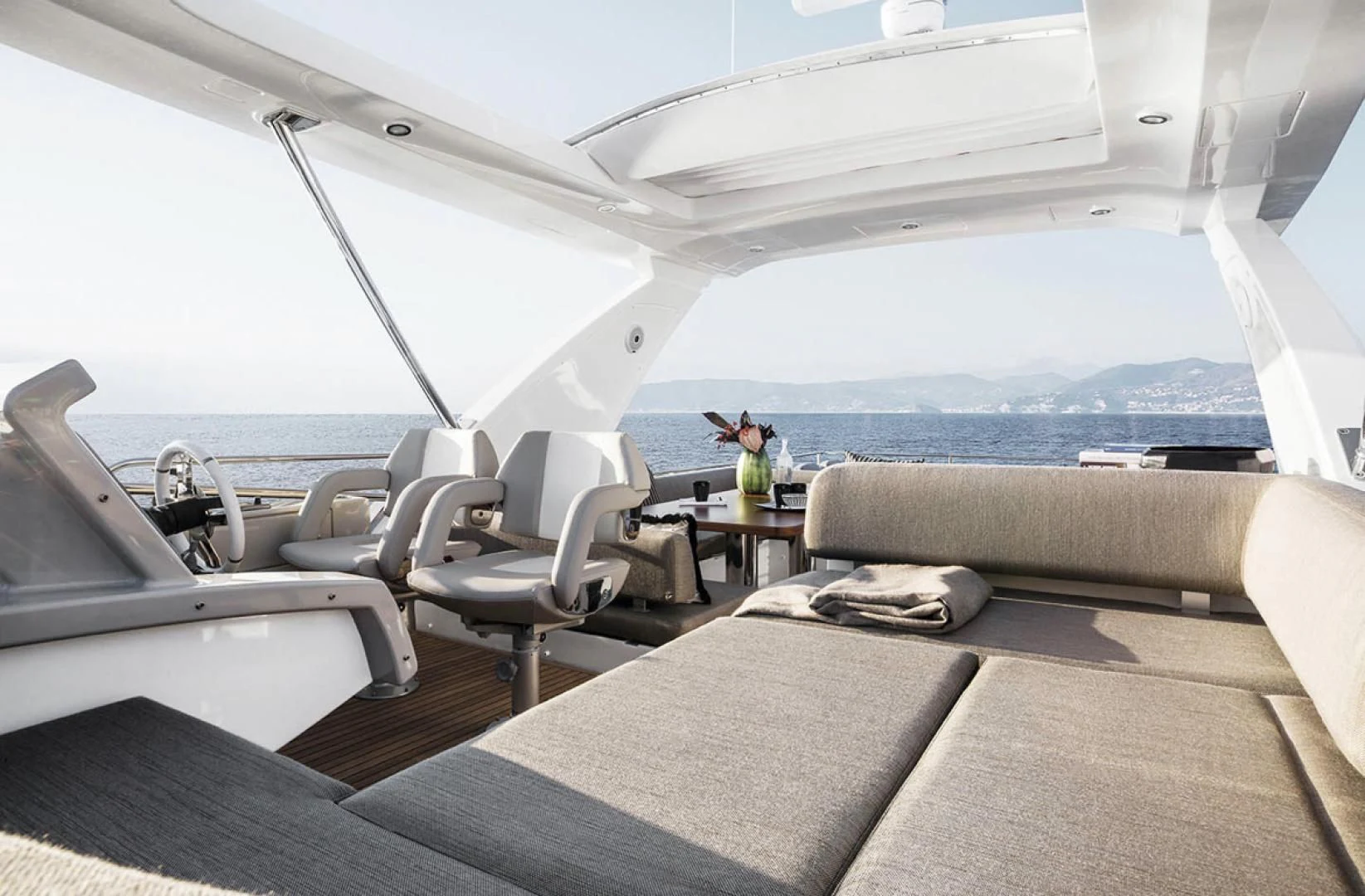 a boat with a table and chairs aboard CERULEAN Yacht for Sale