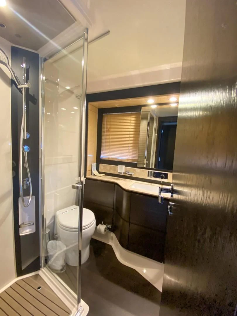 a bathroom with a standup shower aboard CERULEAN Yacht for Sale
