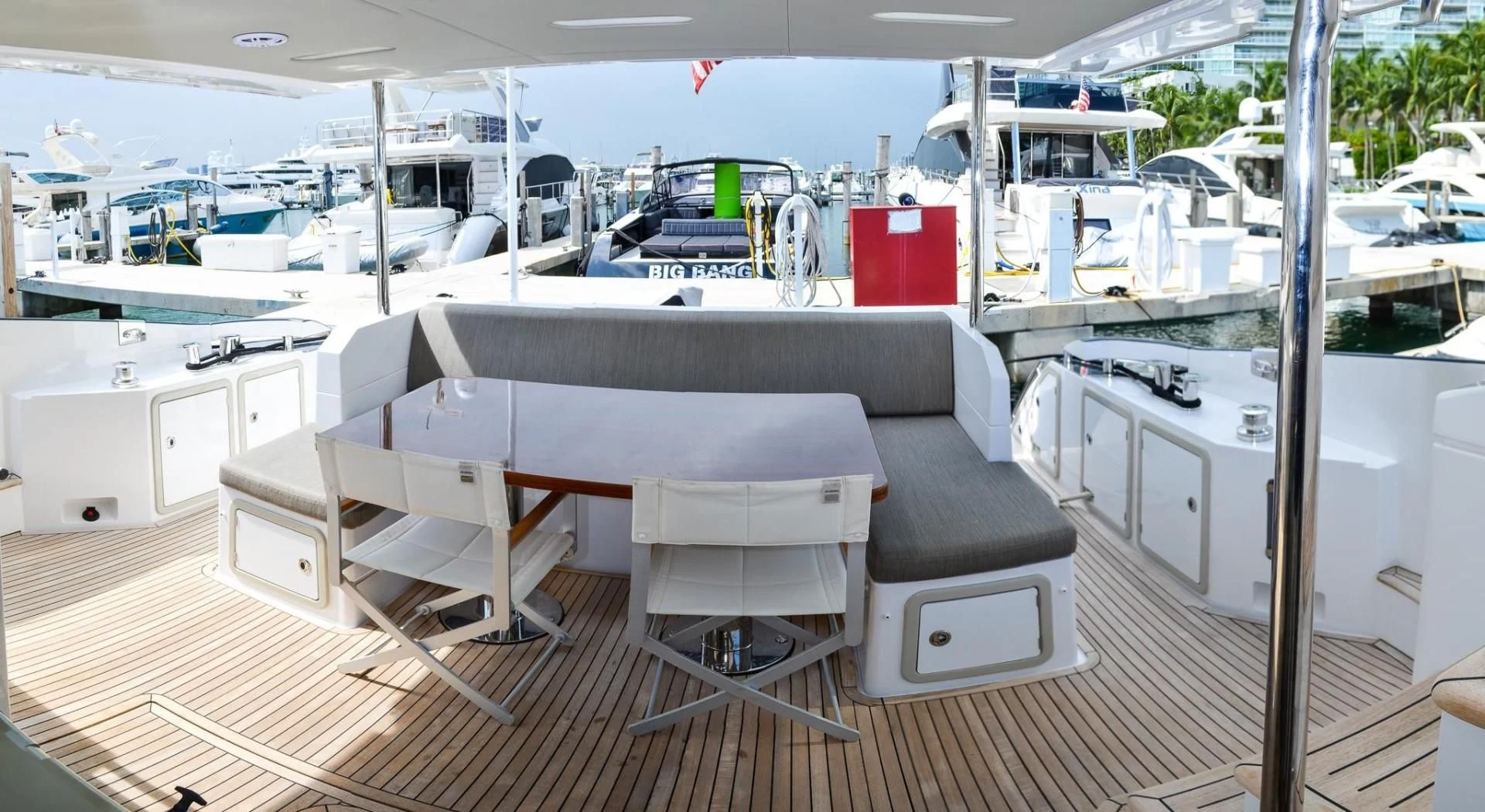 a room with tables and chairs aboard CERULEAN Yacht for Sale