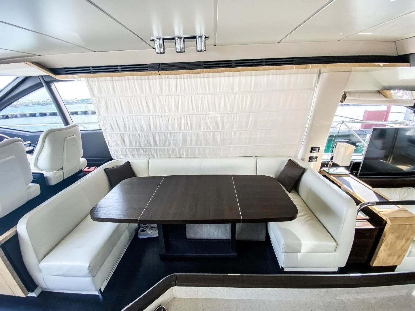 a room with a couch and a table aboard CERULEAN Yacht for Sale