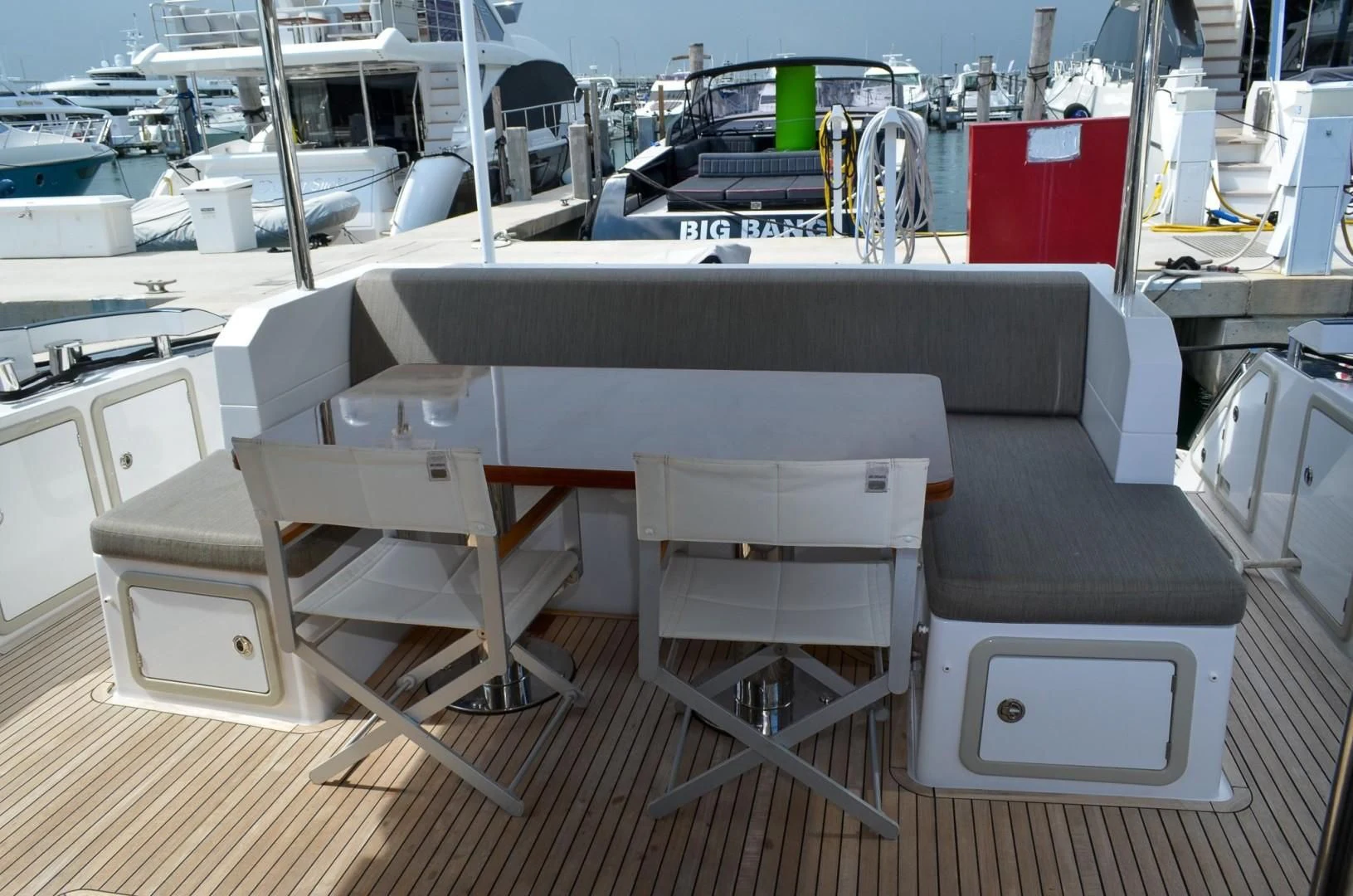 a table with chairs around it aboard CERULEAN Yacht for Sale