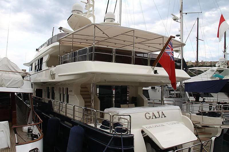a boat with flags on it aboard GAJA Yacht for Sale