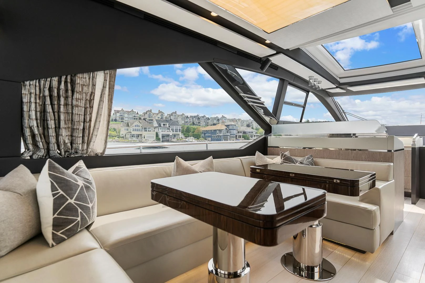 a room with a couch and a table and a window aboard ANONYMOUS Yacht for Sale