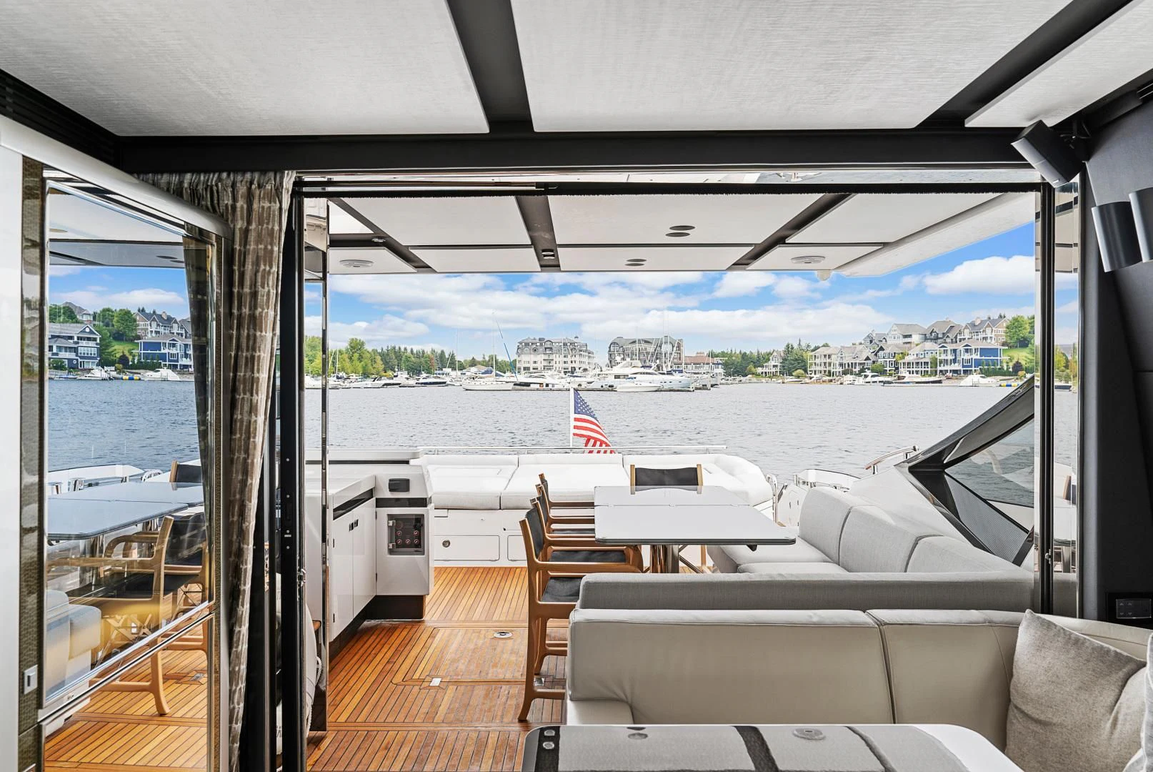 a room with a view of the city and water aboard ANONYMOUS Yacht for Sale
