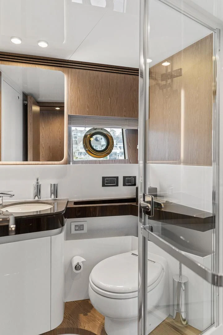 a bathroom with a glass shower aboard ANONYMOUS Yacht for Sale
