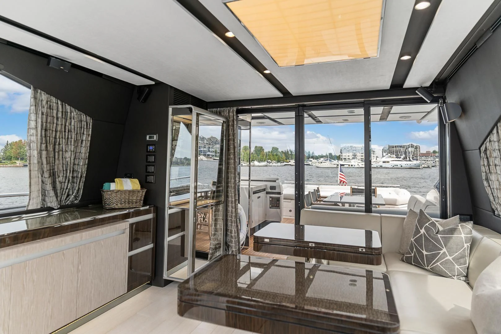 a room with a view of the water and the deck aboard ANONYMOUS Yacht for Sale