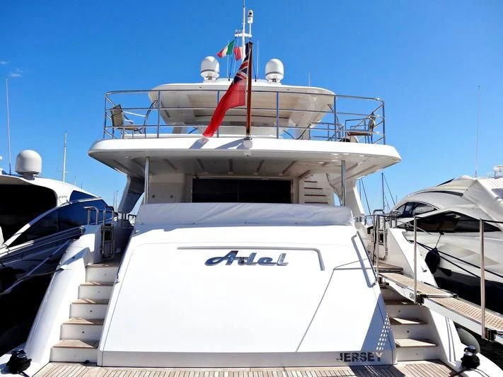 a boat docked at a pier aboard ADEL Yacht for Sale