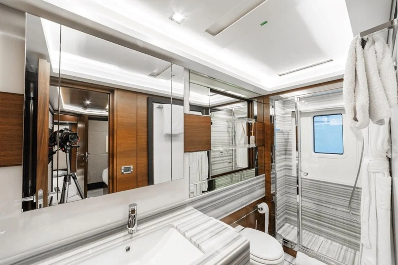 a bathroom with a large mirror aboard ADEL Yacht for Sale