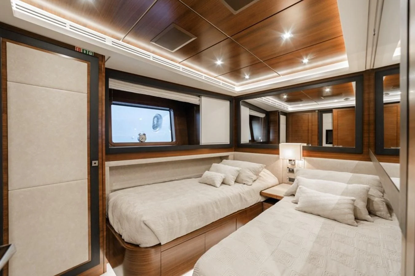 a room with two beds aboard ADEL Yacht for Sale