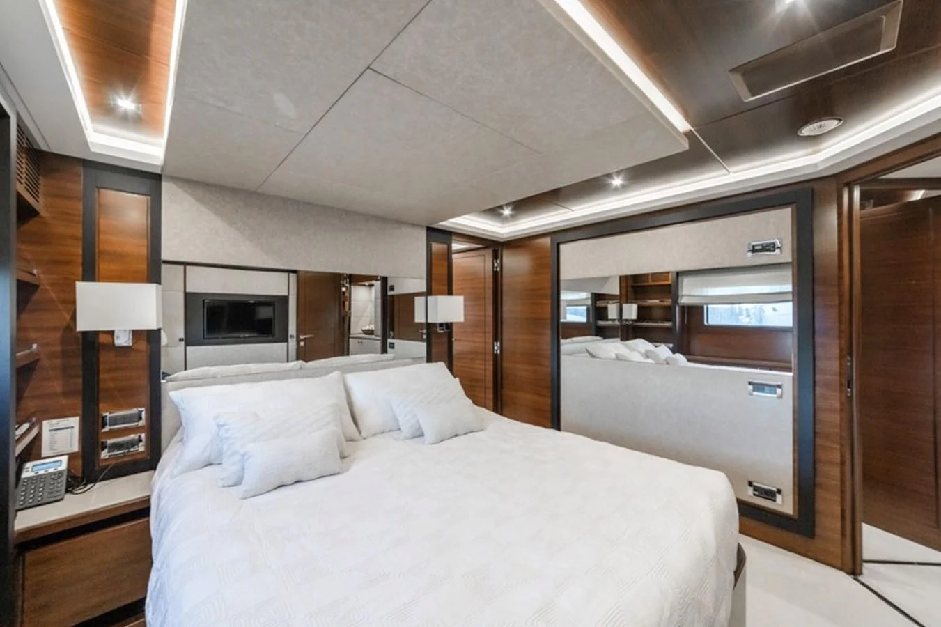 a room with a bed and a desk aboard ADEL Yacht for Sale