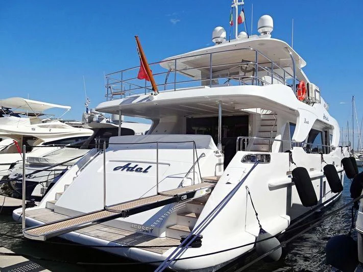 a boat docked at a pier aboard ADEL Yacht for Sale