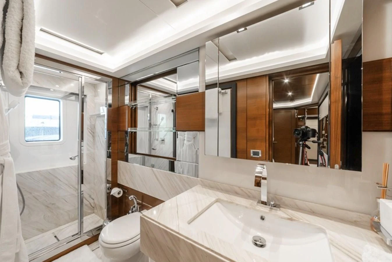 a bathroom with a large mirror aboard ADEL Yacht for Sale
