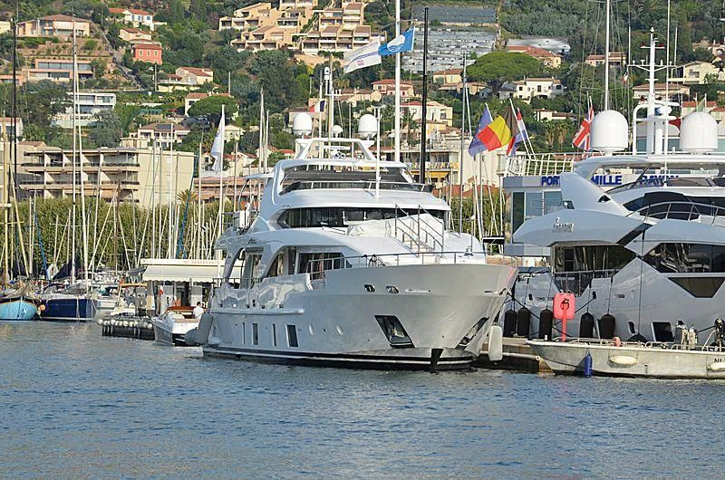 several boats docked at a pier aboard ADEL Yacht for Sale