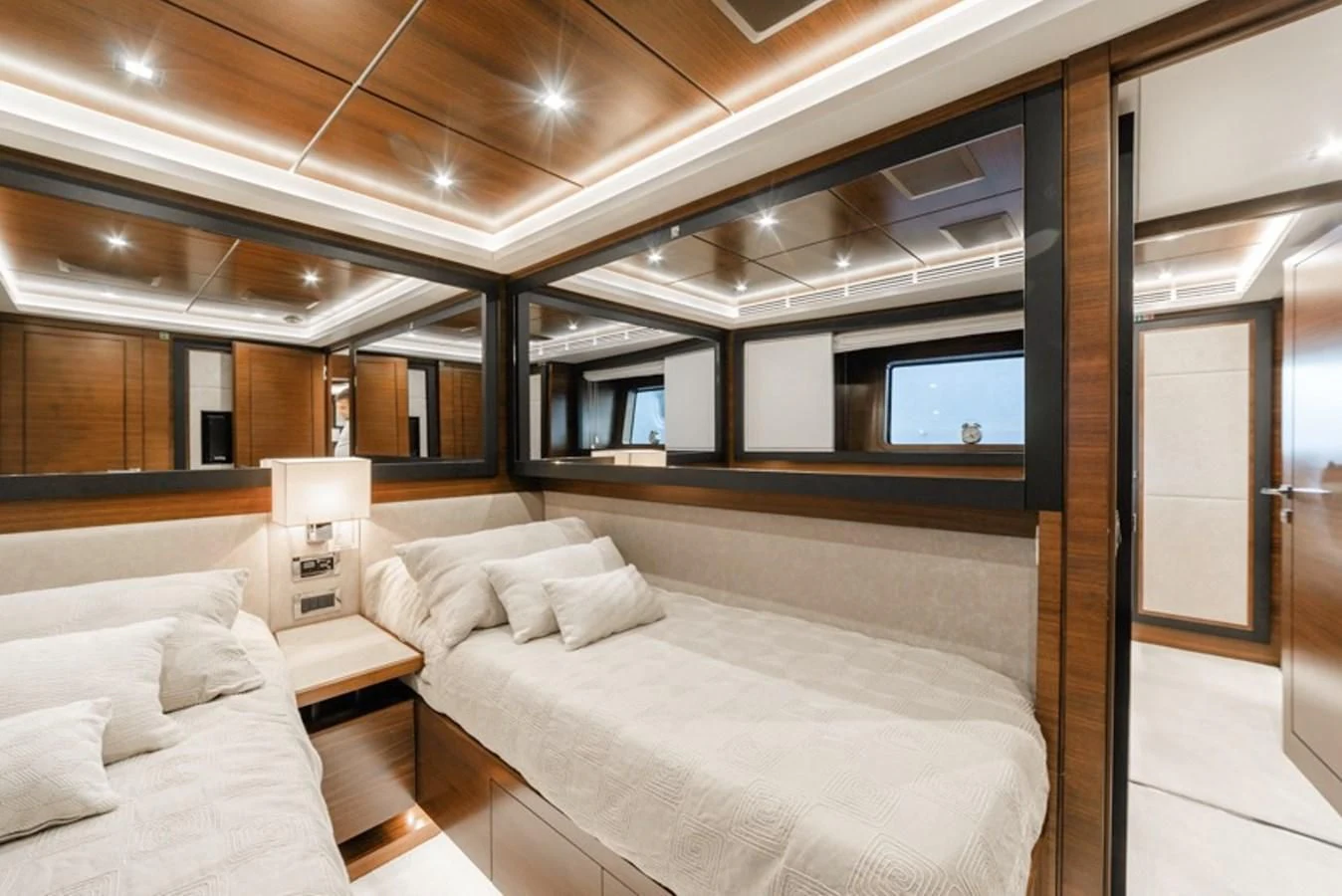 a room with a bed and a tv aboard ADEL Yacht for Sale