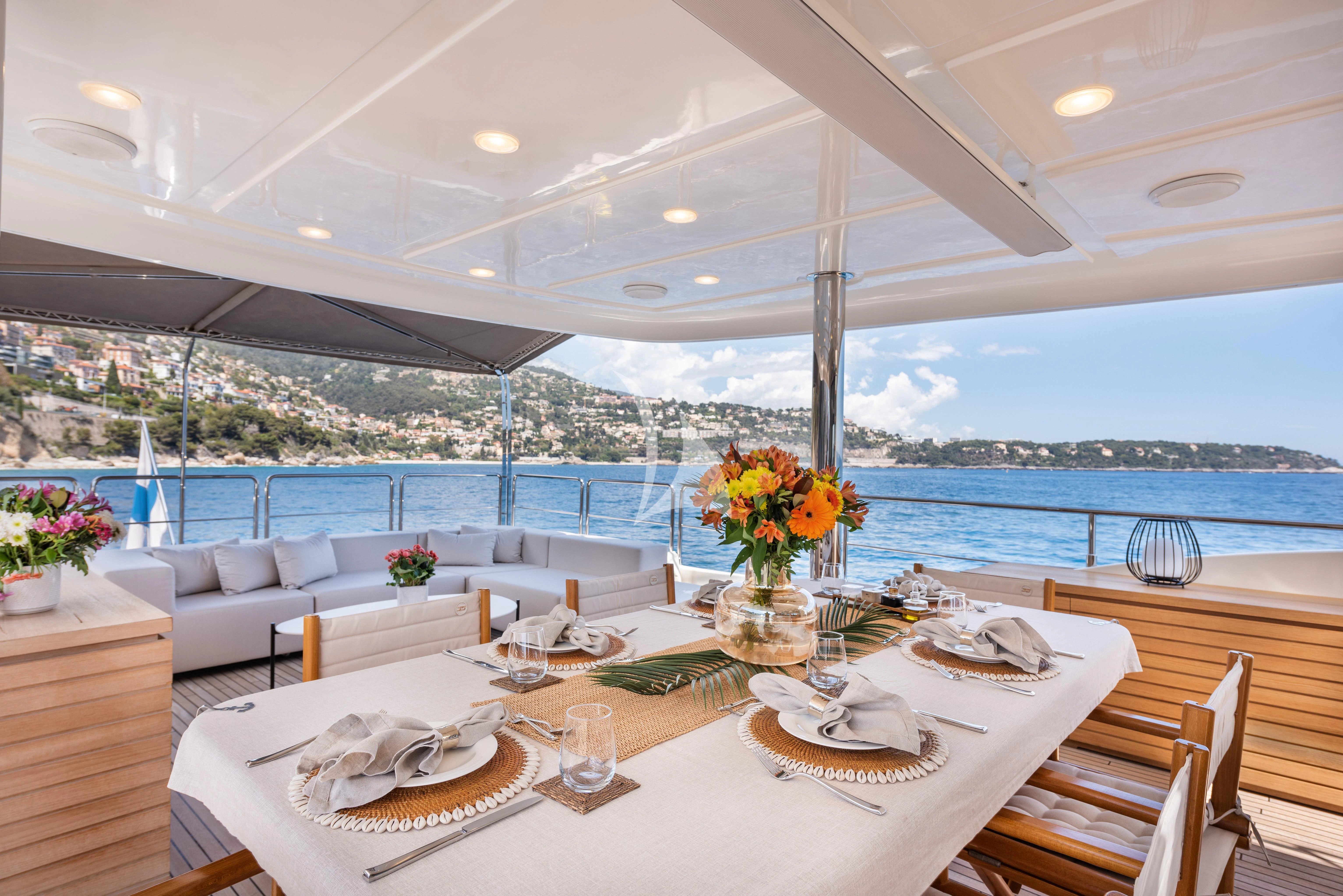 a table set for a meal aboard DISPARATE Yacht for Sale