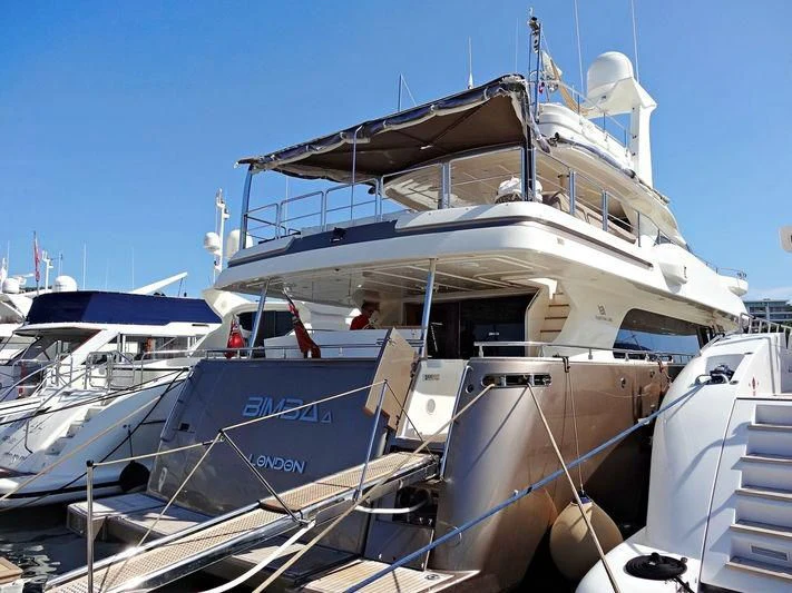 a boat with a ladder on the deck aboard DISPARATE Yacht for Sale