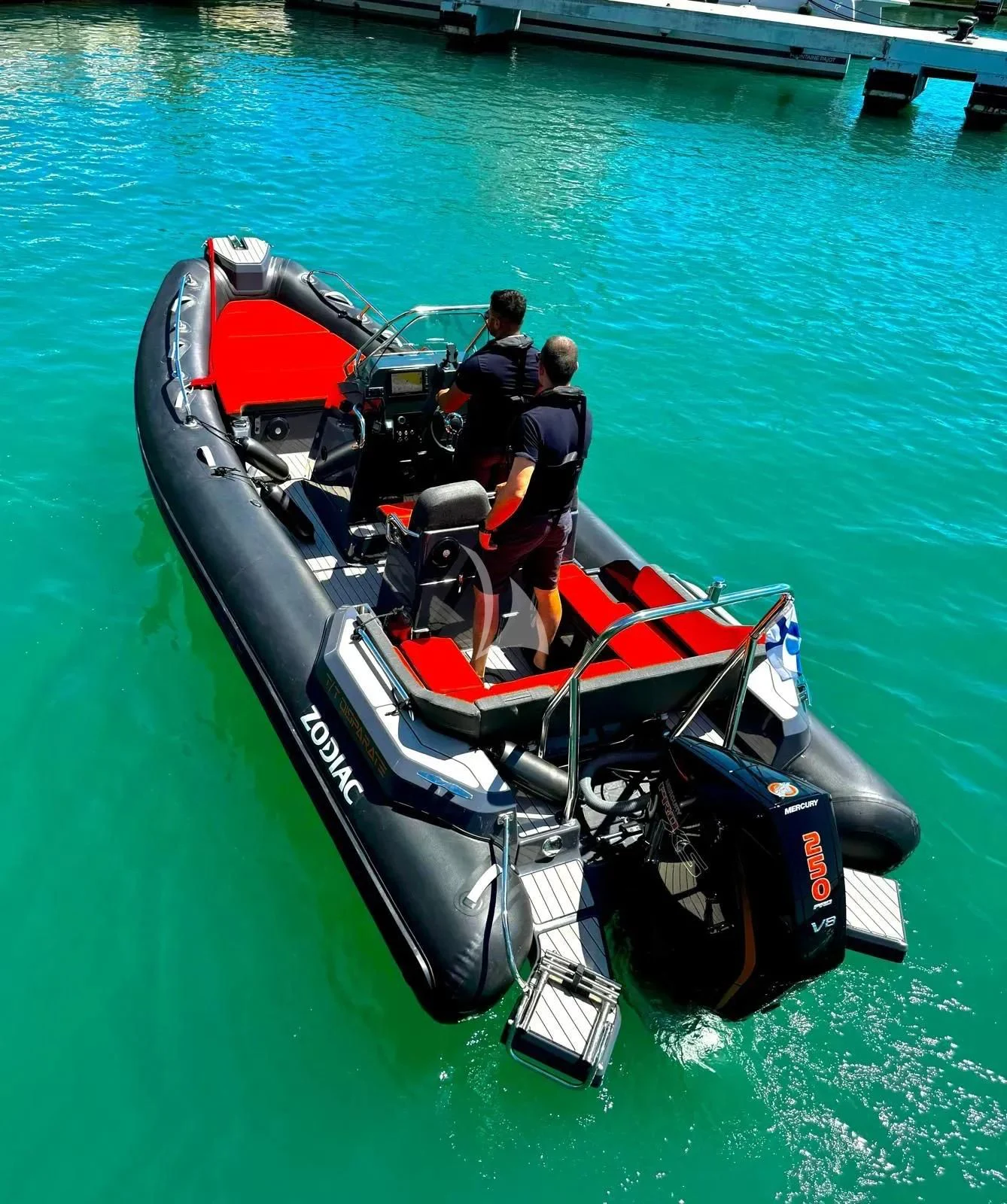 a group of people in a boat aboard DISPARATE Yacht for Sale