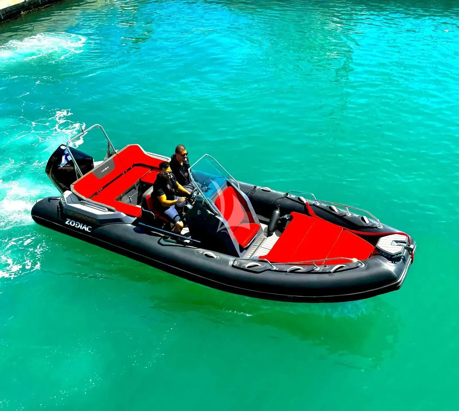 a person in a kayak aboard DISPARATE Yacht for Sale
