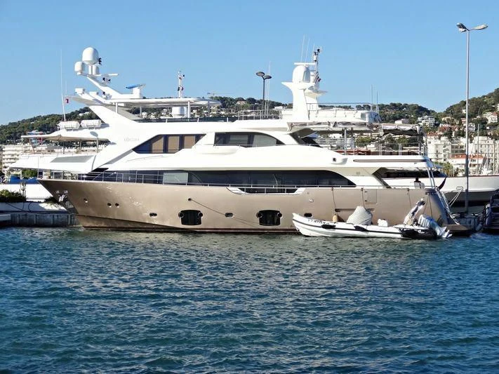 a large white yacht aboard DISPARATE Yacht for Sale