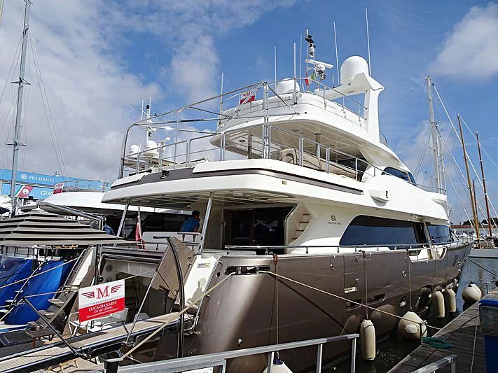 a boat docked at a pier aboard DISPARATE Yacht for Sale