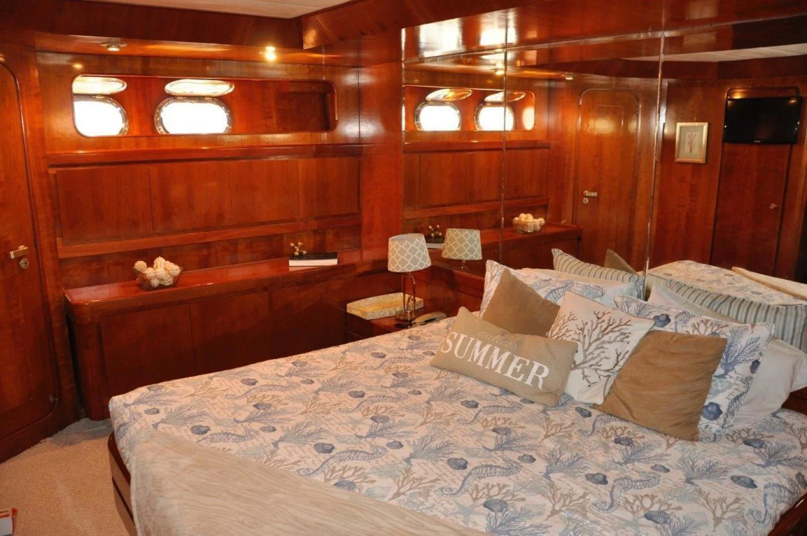 a bed with pillows and pillows aboard M.I.S. MOONDANCE Yacht for Sale