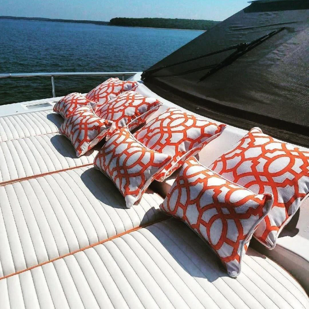 a red and white umbrella on a deck aboard M.I.S. MOONDANCE Yacht for Sale