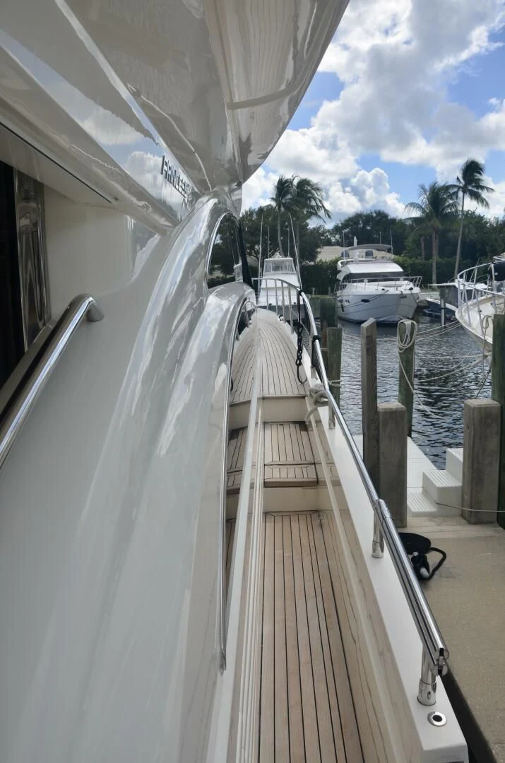 a deck with a boat and a dock aboard W Yacht for Sale